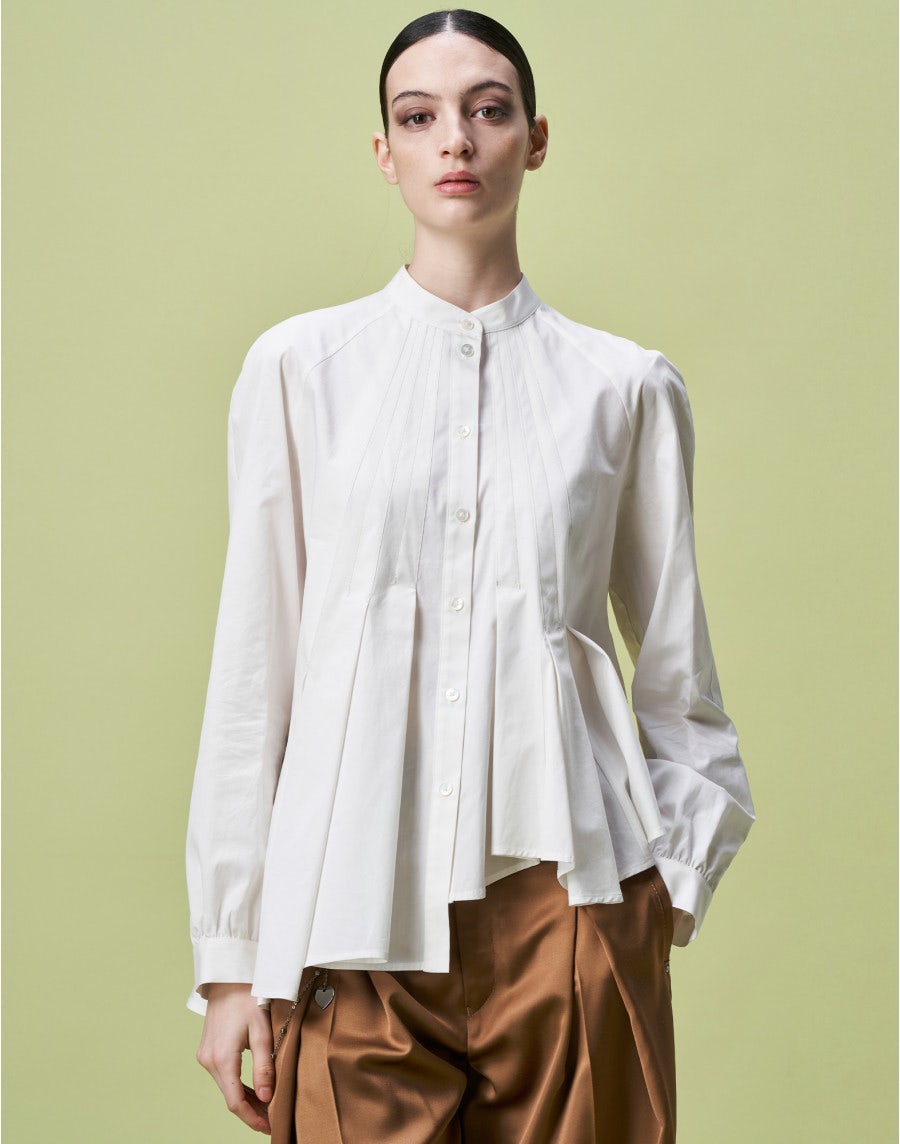 BEGUILE: Raglan sleeve shirt with full flared asymmetric hem